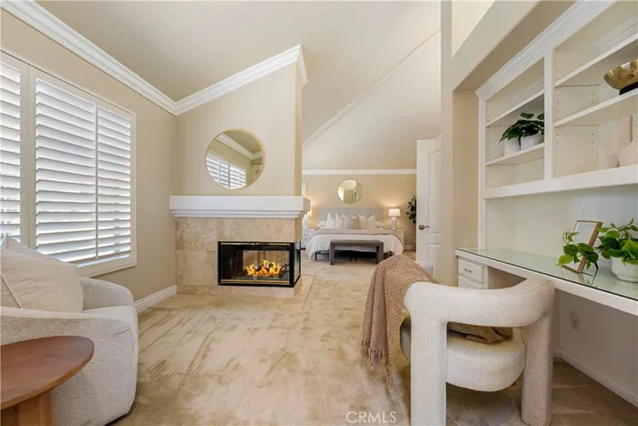 Primary suite retreat photo has been digitally enhanced