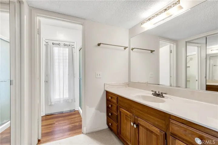 Primary ensuite with door to the side yard.