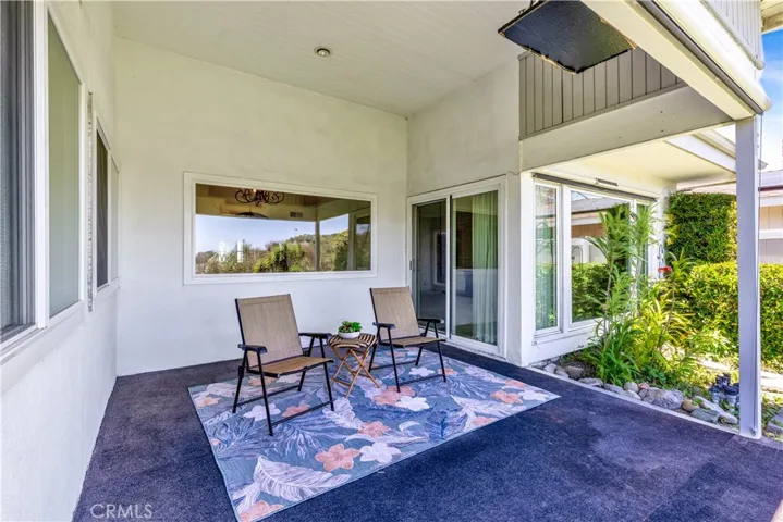Covered patio with view of the backyard.