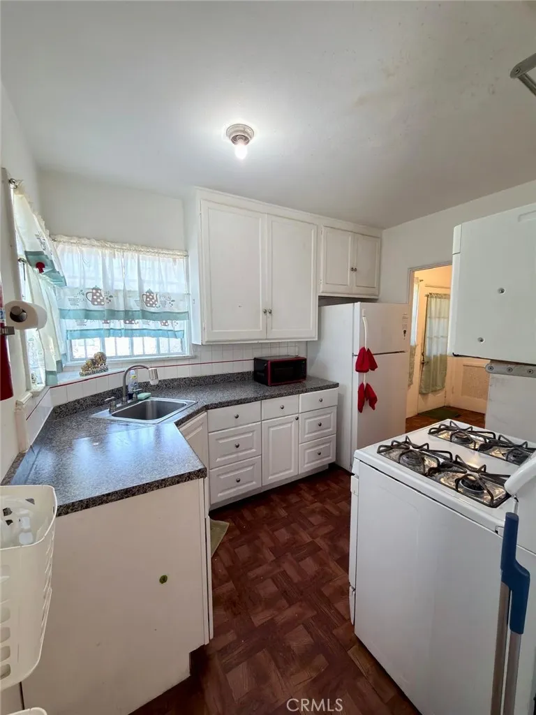 Bright kitchen includes stove and refrigerator!