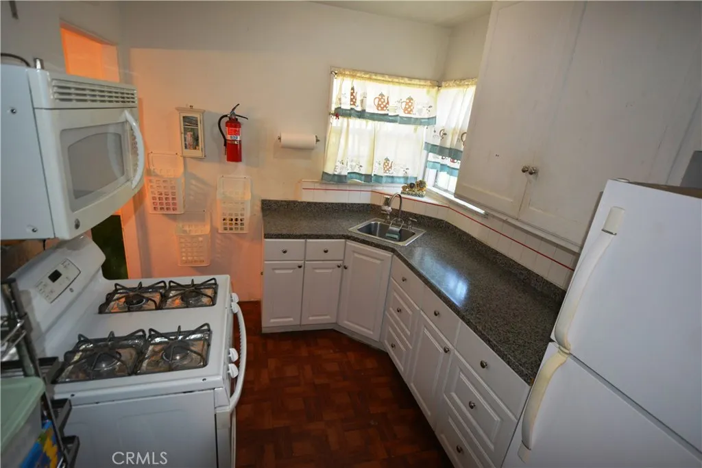 Another view of the spacious kitchen
