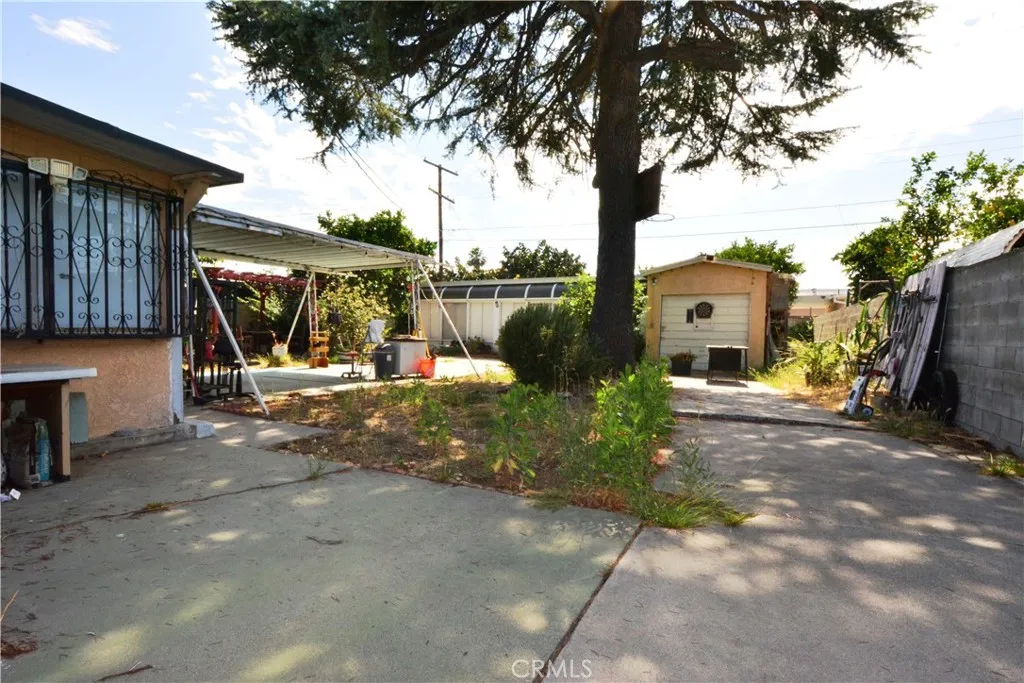 This yard is surrounded by a block wall