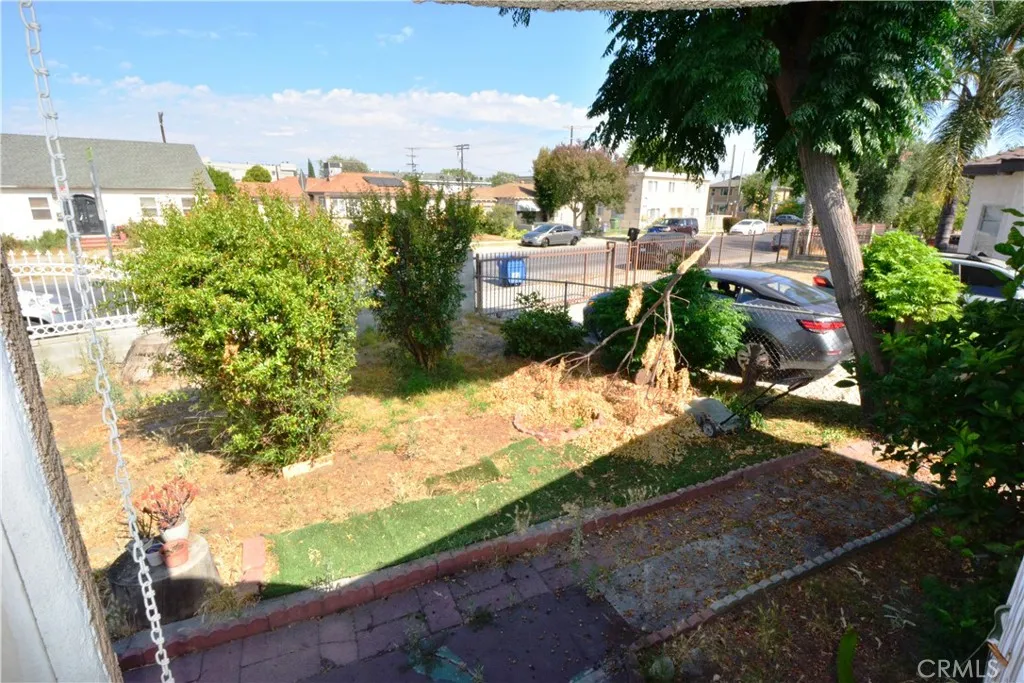 Another view of the front yard from doorway