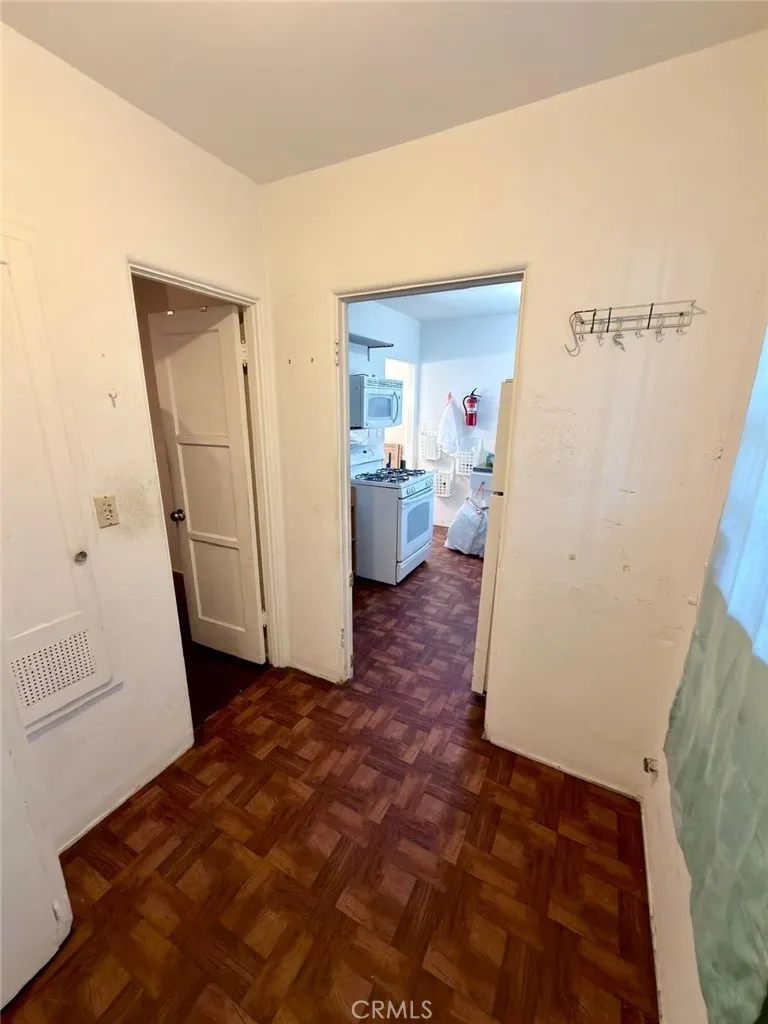 This space could aid to expand the kitchen or remain a utility room,
