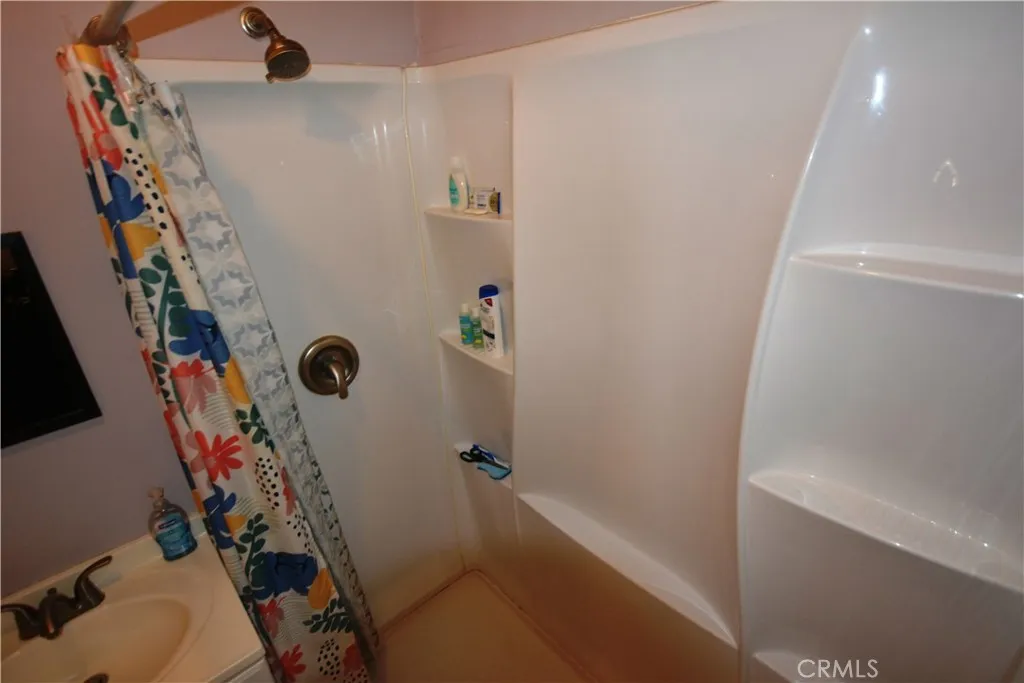 Walk in shower is spacious.
