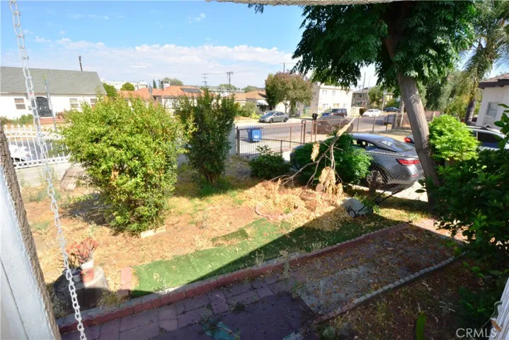 Another view of the front yard from doorway