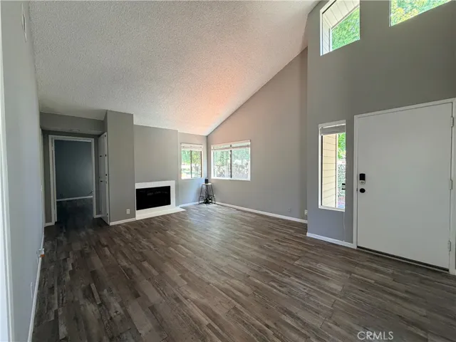Main living area off the front entrance. Vaulted ceiling to allow for more natural light