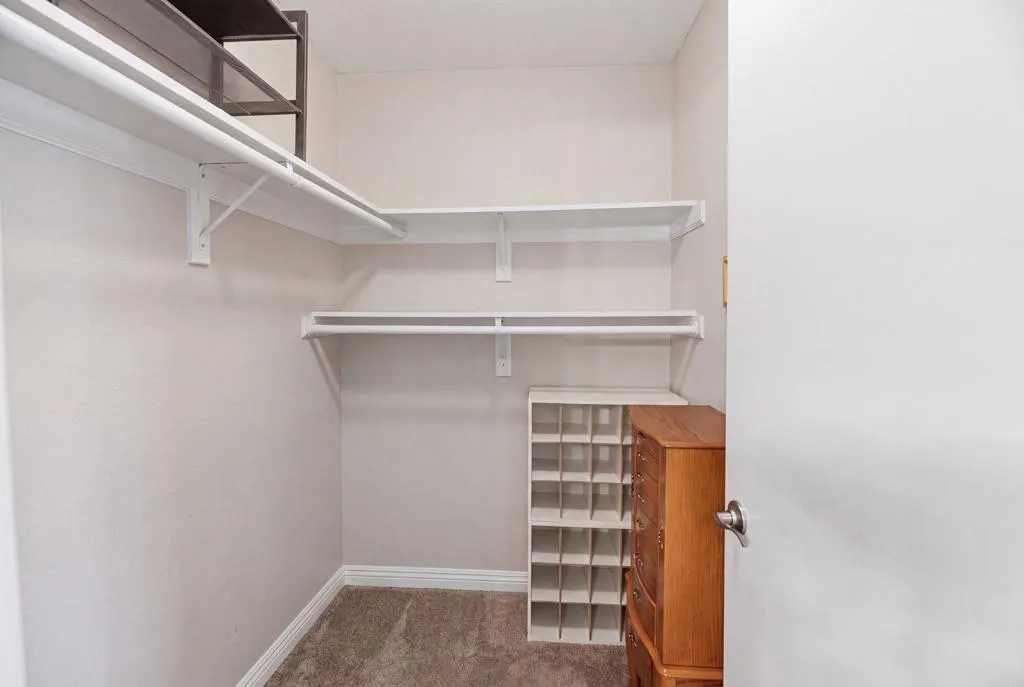 Both bedrooms have spacious  "walk-in" closets.