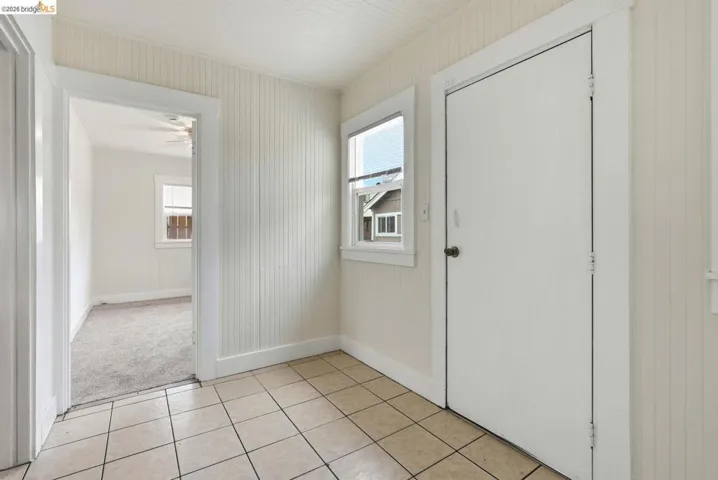 Tile flooring with beadboard wall paneling