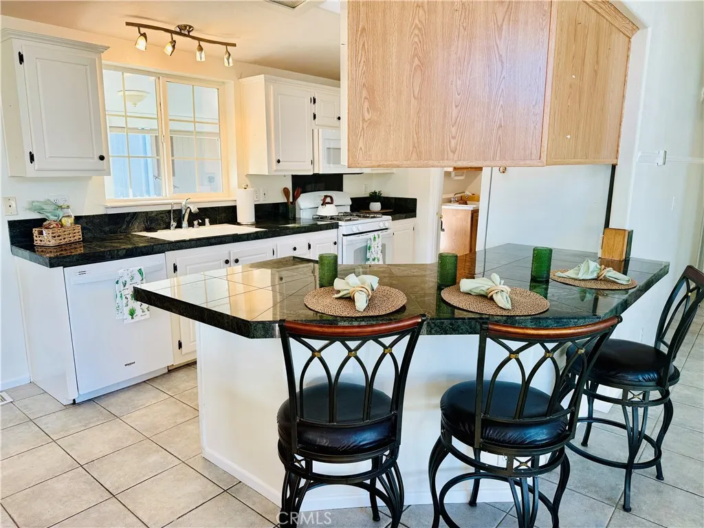 Breakfast bar extends the dining area for casual dining.