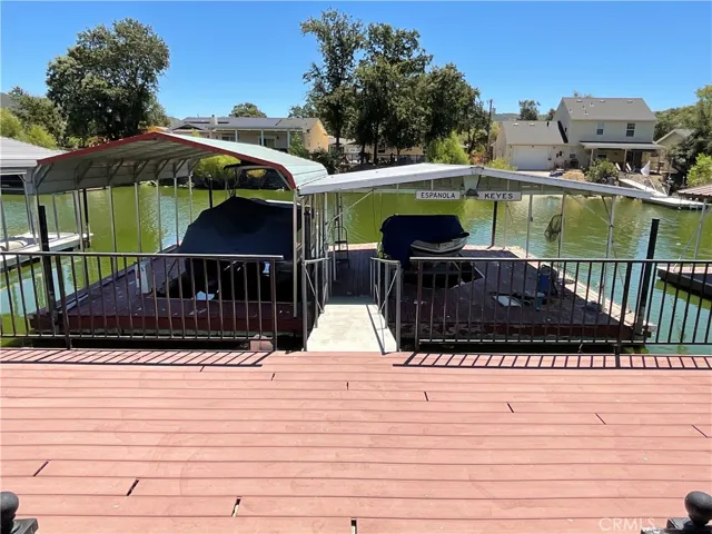 Boat docks with lifts on the channel of Clear Lake