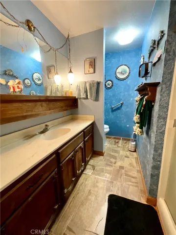 Primary Bathroom has plenty of room to clean up after your fishing, boating, jet skiing or all else you might do