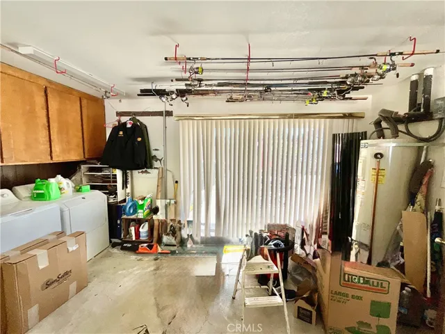 Store your fishing rods up high not far from where you wash and dry... spacious garage just next to the back patio and breezeway by front door.