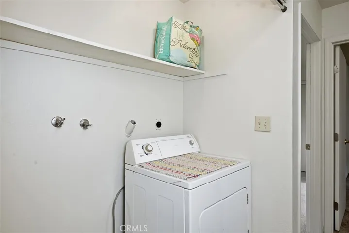 Laundry area in hall.