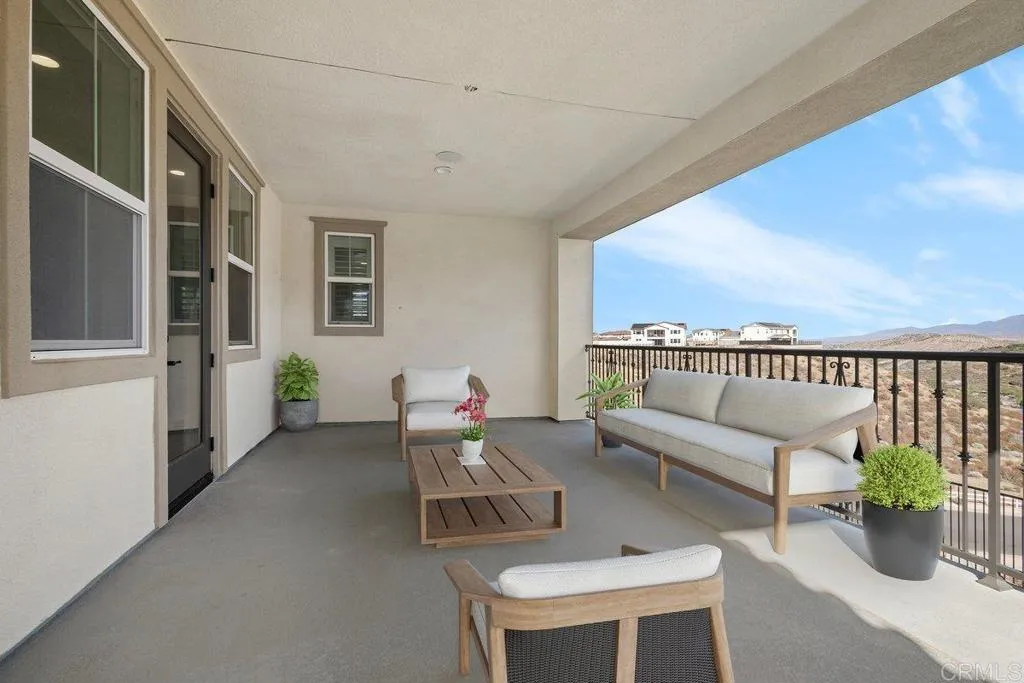 Virtually Staged Balcony; Original included in gallery