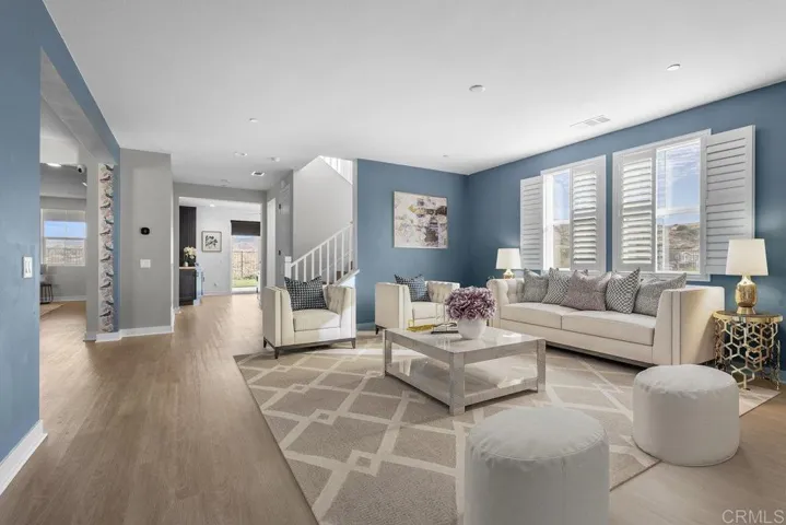 Virtually Staged Living Room; Original photo included in gallery
