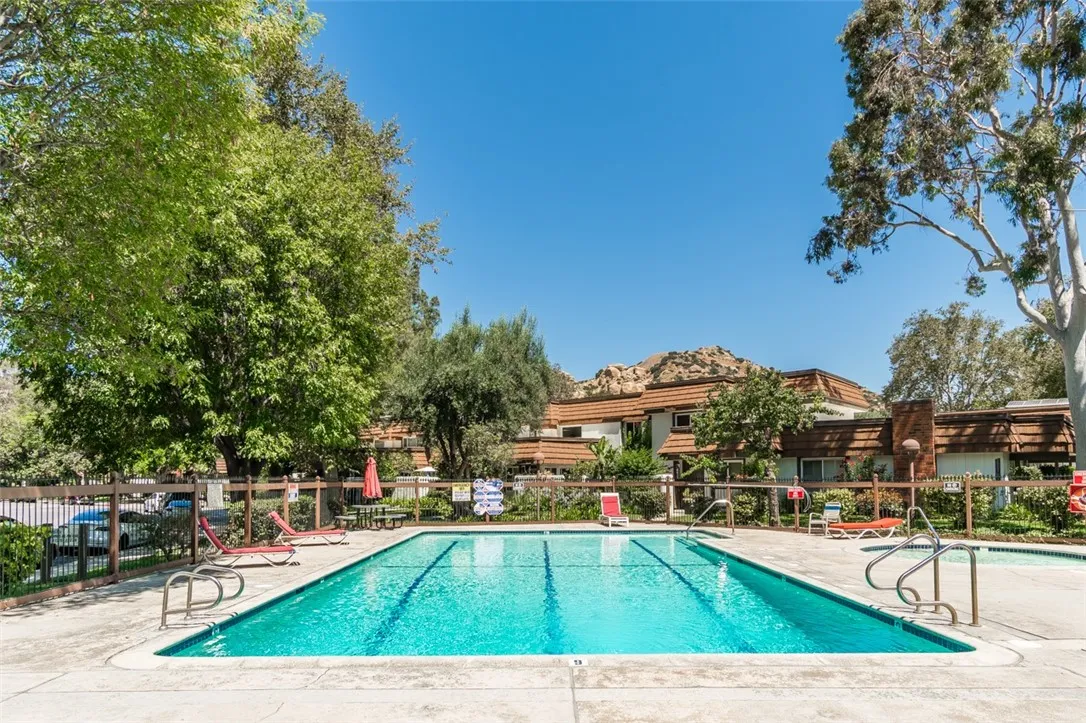 Community pool area next to unit