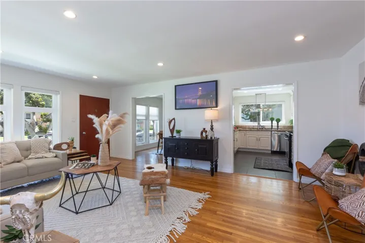 dual pane windows thru out, dining room to left, kitchen stainless appliances to right