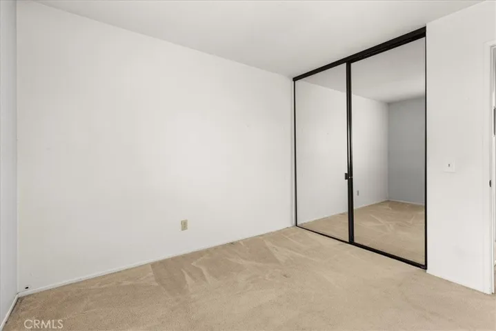 2nd bedroom mirrored closet doors
