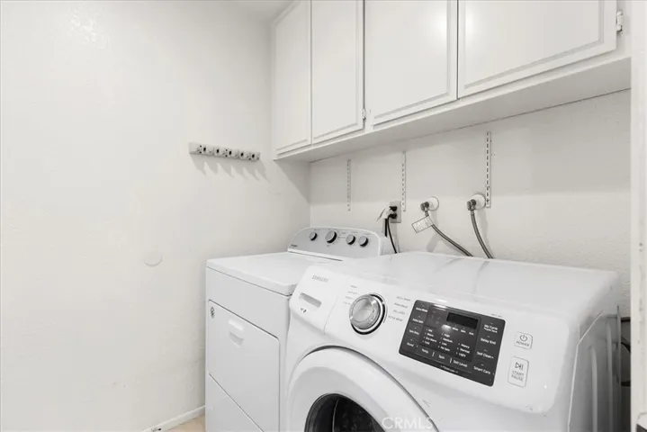 Laundry room with storage