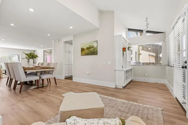 Sitting area, built in book shelves can be used for home office space with natural light