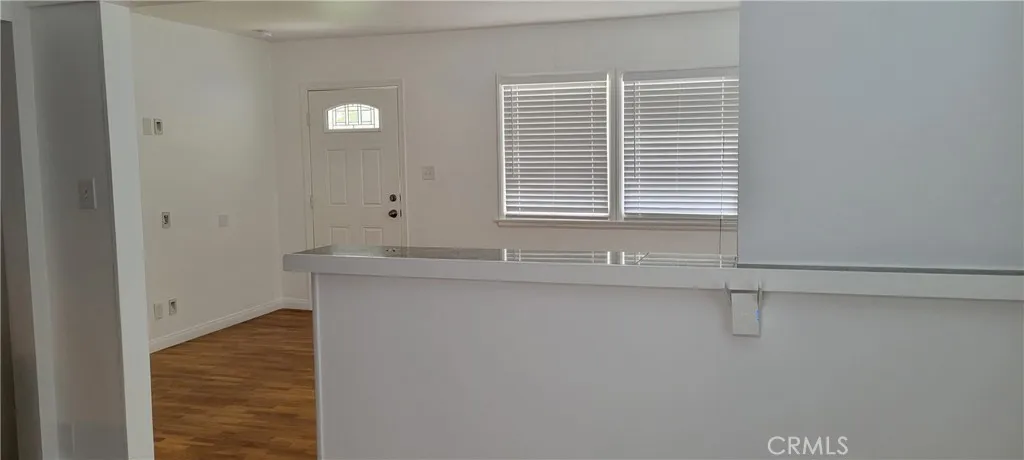 From Kitchen looking into living room and entry way