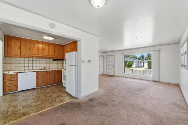 Kitchen opens to dining space.