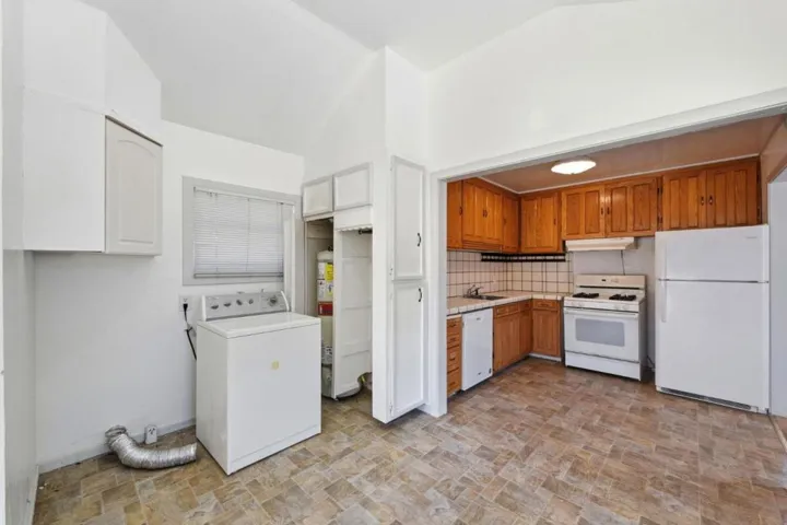 Laundry space off the kitchen.