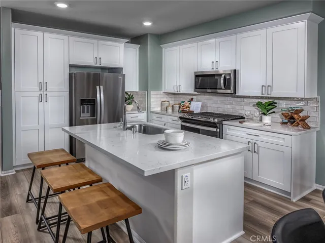 Photos are not of the actual home, but are photos of the builder home with same floorplan with similar interior finishes.