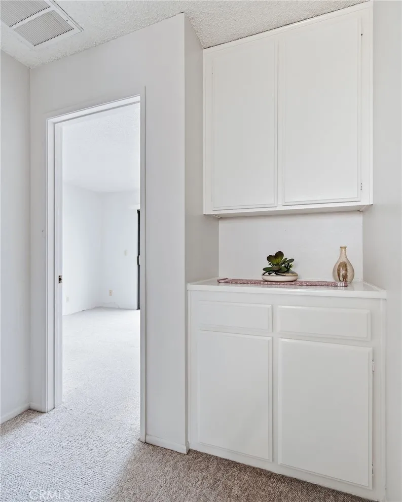 Upstairs Hall Landing with Storage Cabinet