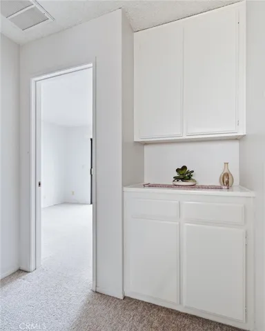 Upstairs Hall Landing with Storage Cabinet