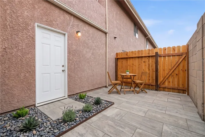 This photo has been AI enhanced to give you an idea of what the patio can look like
