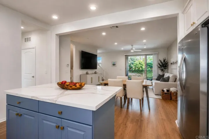 Lifestyle - Modern open-plan living with blue accents