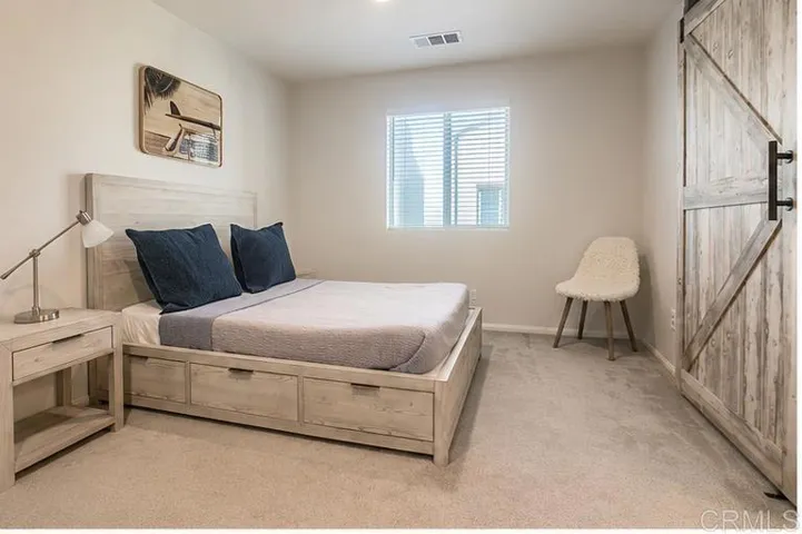 Bed suite 2 - Surf barn door bedroom_angle_door