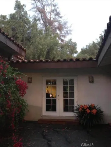 Front entrance to charming spanish style guest house.