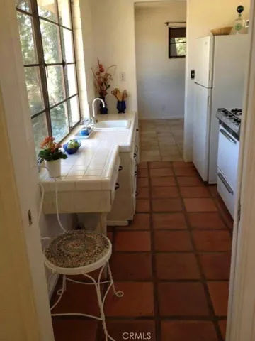 Another view of the kitchen.