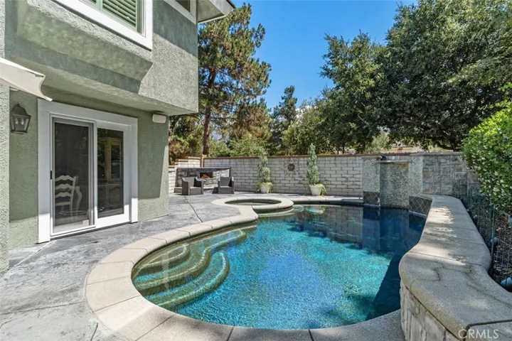 Luscious pool and jacuzzi and the pizza oven
