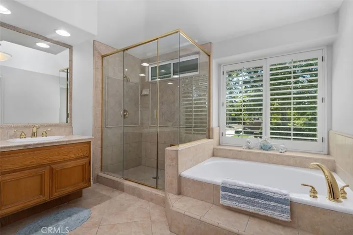 Primary bath with a bathtub and separate shower