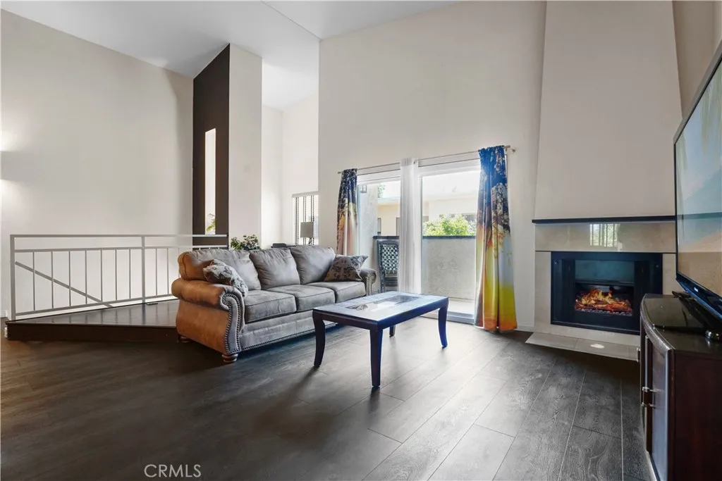 Soaring ceilings, plus balcony and office nook.
