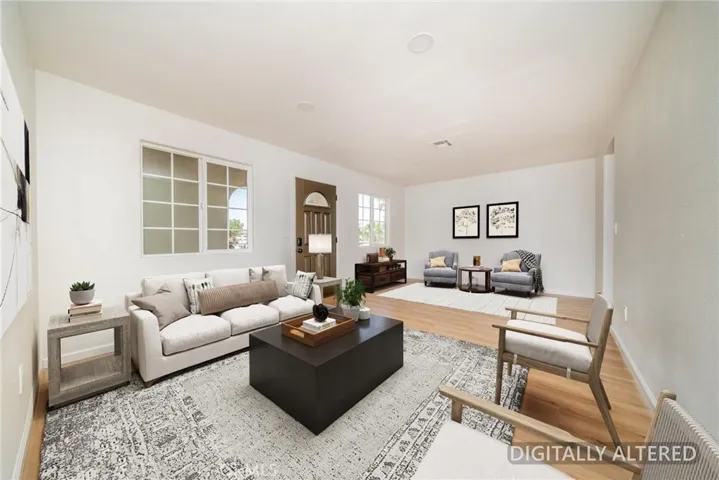Living Room (Disclaimer: Some images have been digitally enhanced with virtual staging to illustrate potential room layouts and furnishings. Actual property condition and features may vary. Buyer to verify all information independently).