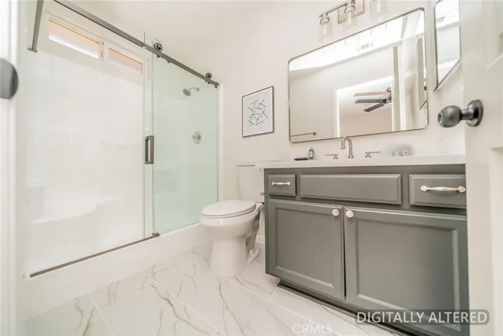 Primary Bathroom (Disclaimer: Some images have been digitally enhanced with virtual staging to illustrate potential room layouts and furnishings. Actual property condition and features may vary. Buyer to verify all information independently).