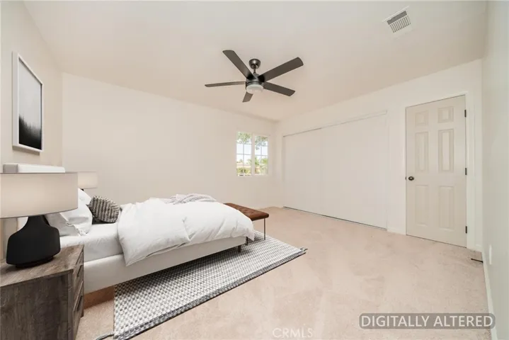 Bedroom 2 (Disclaimer: Some images have been digitally enhanced with virtual staging to illustrate potential room layouts and furnishings. Actual property condition and features may vary. Buyer to verify all information independently).