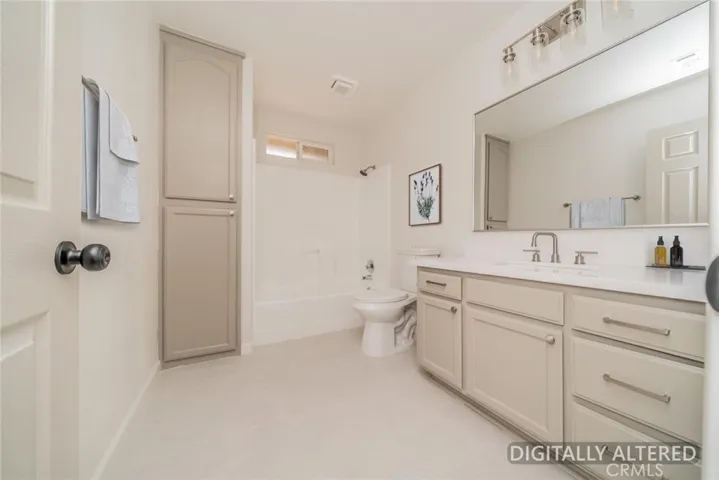 Bathroom (Disclaimer: Some images have been digitally enhanced with virtual staging to illustrate potential room layouts and furnishings. Actual property condition and features may vary. Buyer to verify all information independently).