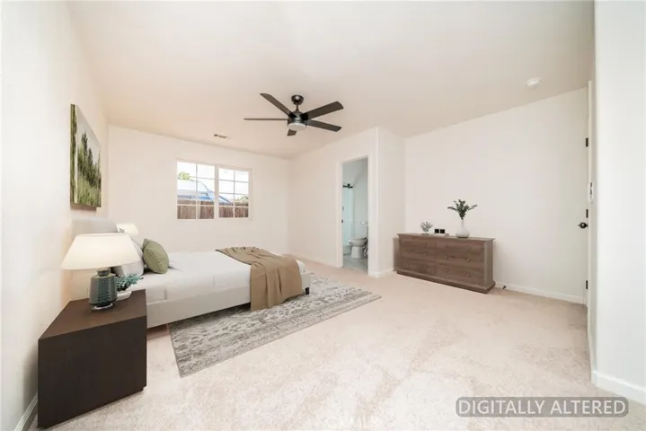 Primary Suite (Disclaimer: Some images have been digitally enhanced with virtual staging to illustrate potential room layouts and furnishings. Actual property condition and features may vary. Buyer to verify all information independently).