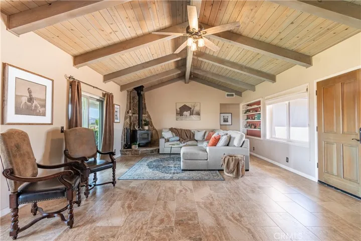 The spacious great room is accented with these beautiful ceilings.