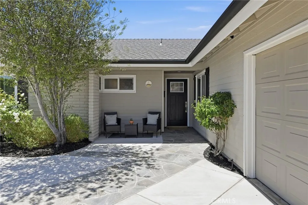 Inviting entrance with side-facing garage