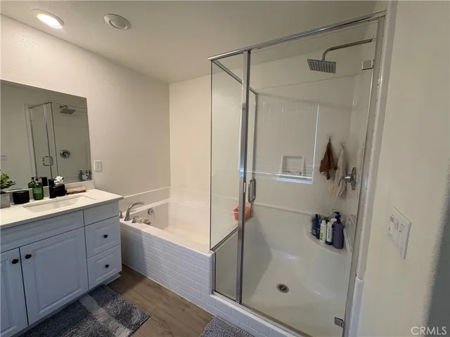 Primary bathroom tub and shower