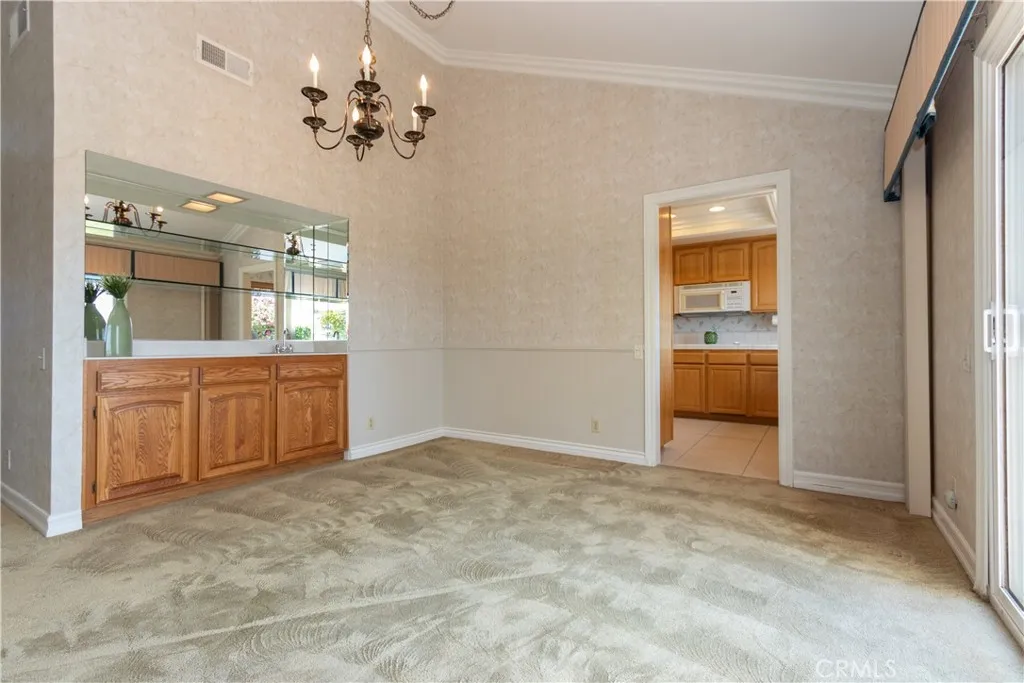 Wet bar and cabinets in the dining room.