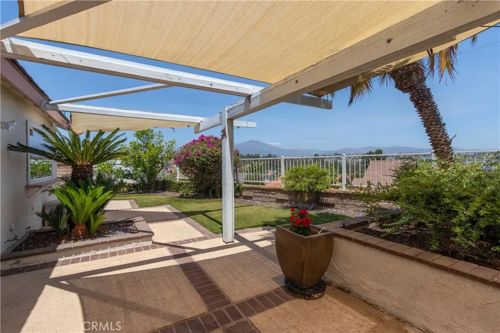 Lovely backyard-half patio/half turf-enjoys the mountain view.
