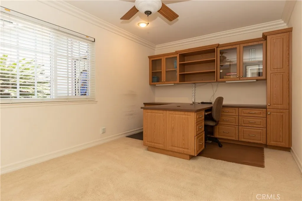 Fourth bedroom is currently an office with dual sided desk.